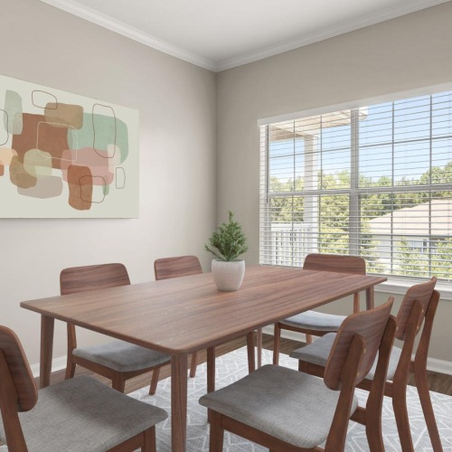 Wide open living areas perfect for entertaining a dining room table with chairs around it